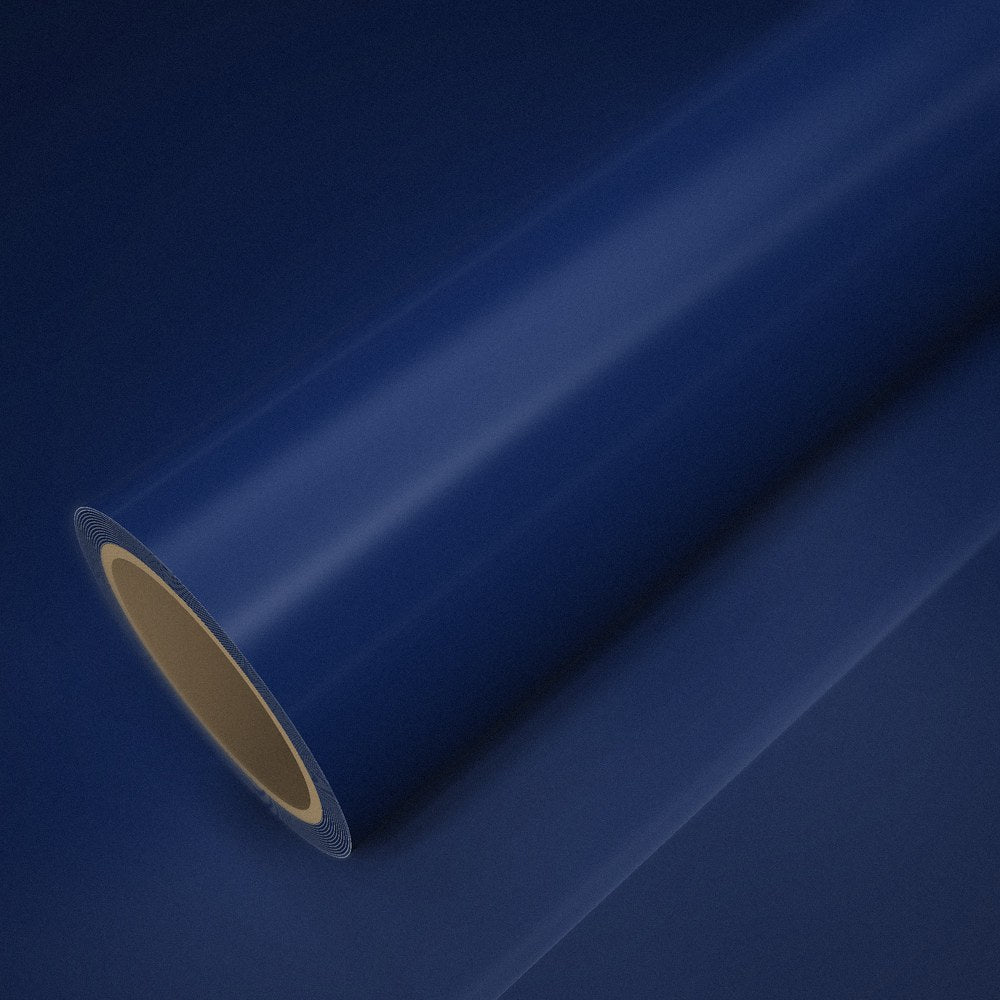 Roll of ICR® Super Paint midnight blue vinyl wrap on a sheet of the same vinyl
