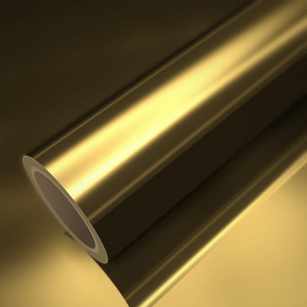 Roll of gold chrome vinyl wrap on a sheet of the same vinyl