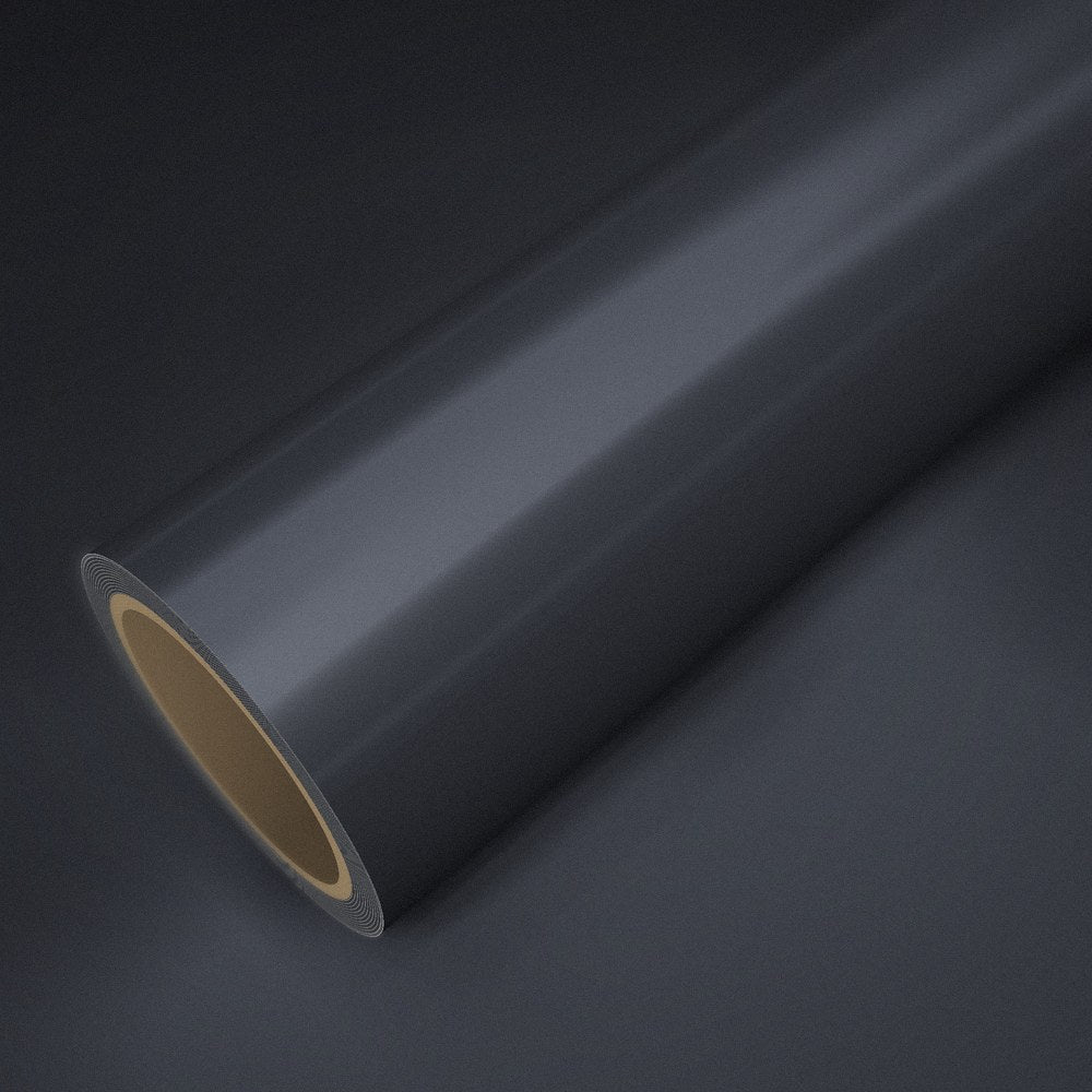 Roll of satin chrome gunmetal vinyl wrap on a sheet of the same vinyl