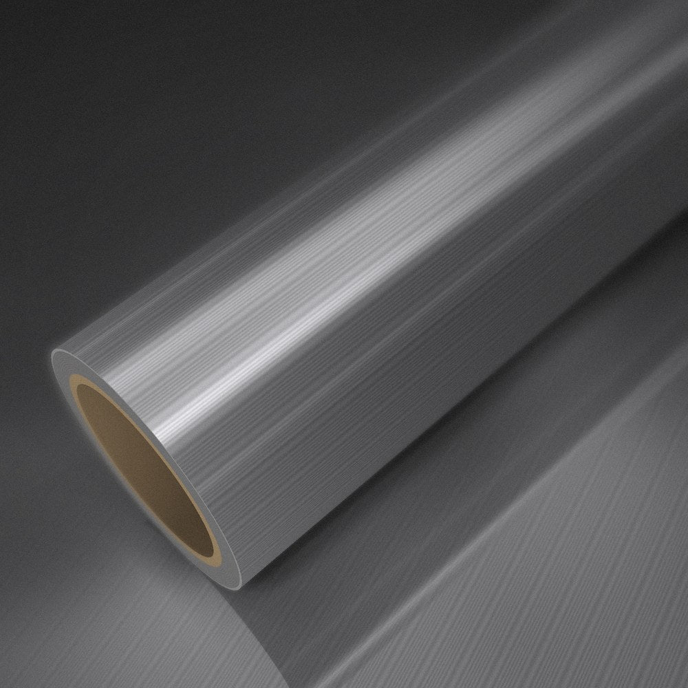 Roll of brushed aluminium vinyl wrap on a sheet of the same vinyl
