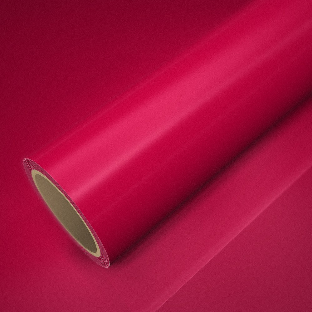 Roll of ICR® Red Soul vinyl wrap on a sheet of the same vinyl