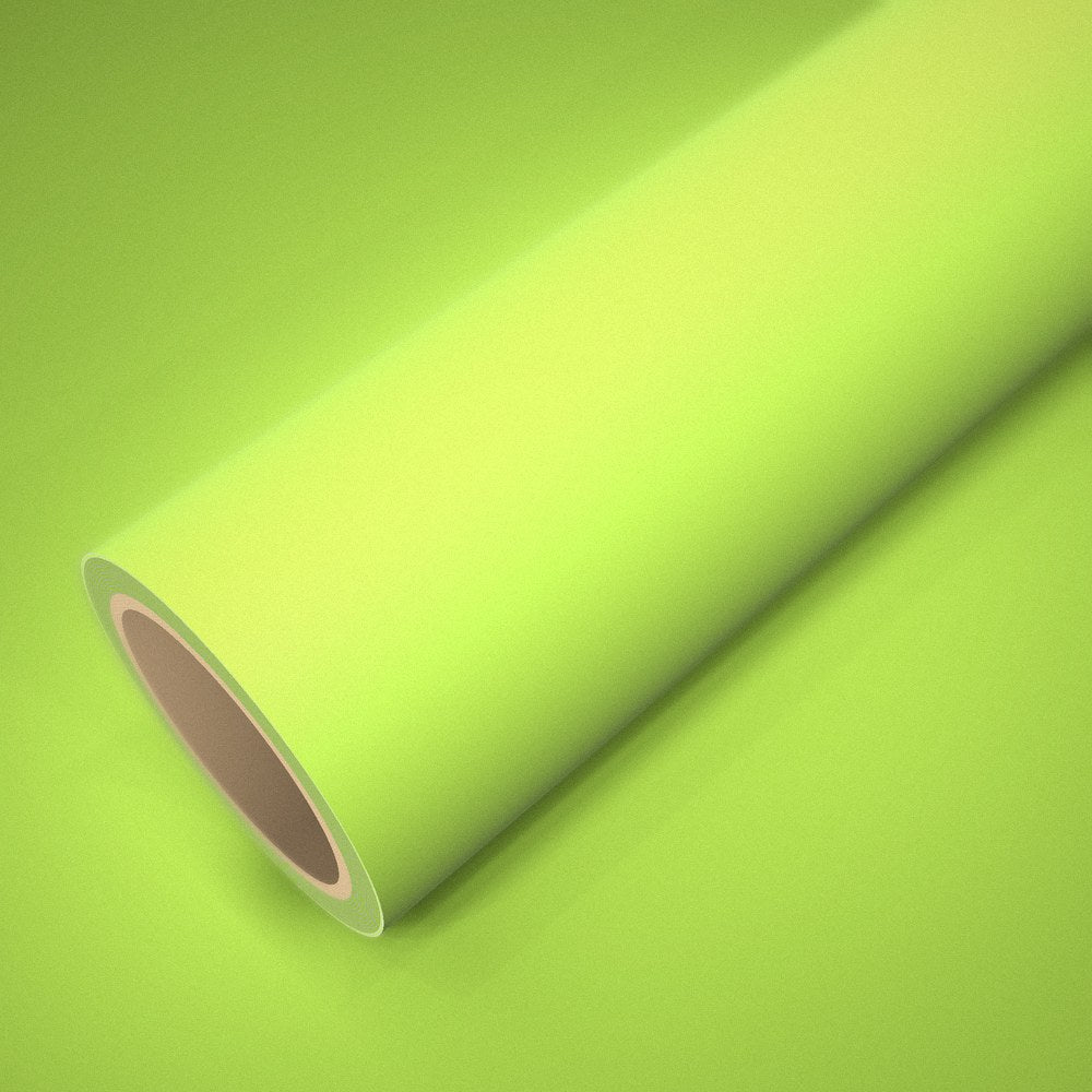 Roll of ICR® matte fluorescent yellow vinyl wrap on a sheet of the same vinyl
