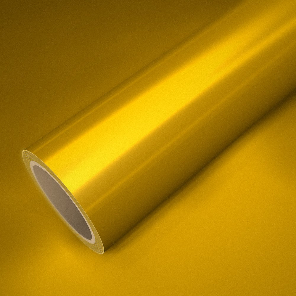 Roll of ICR® satin metallic yellow vinyl wrap on a sheet of the same vinyl