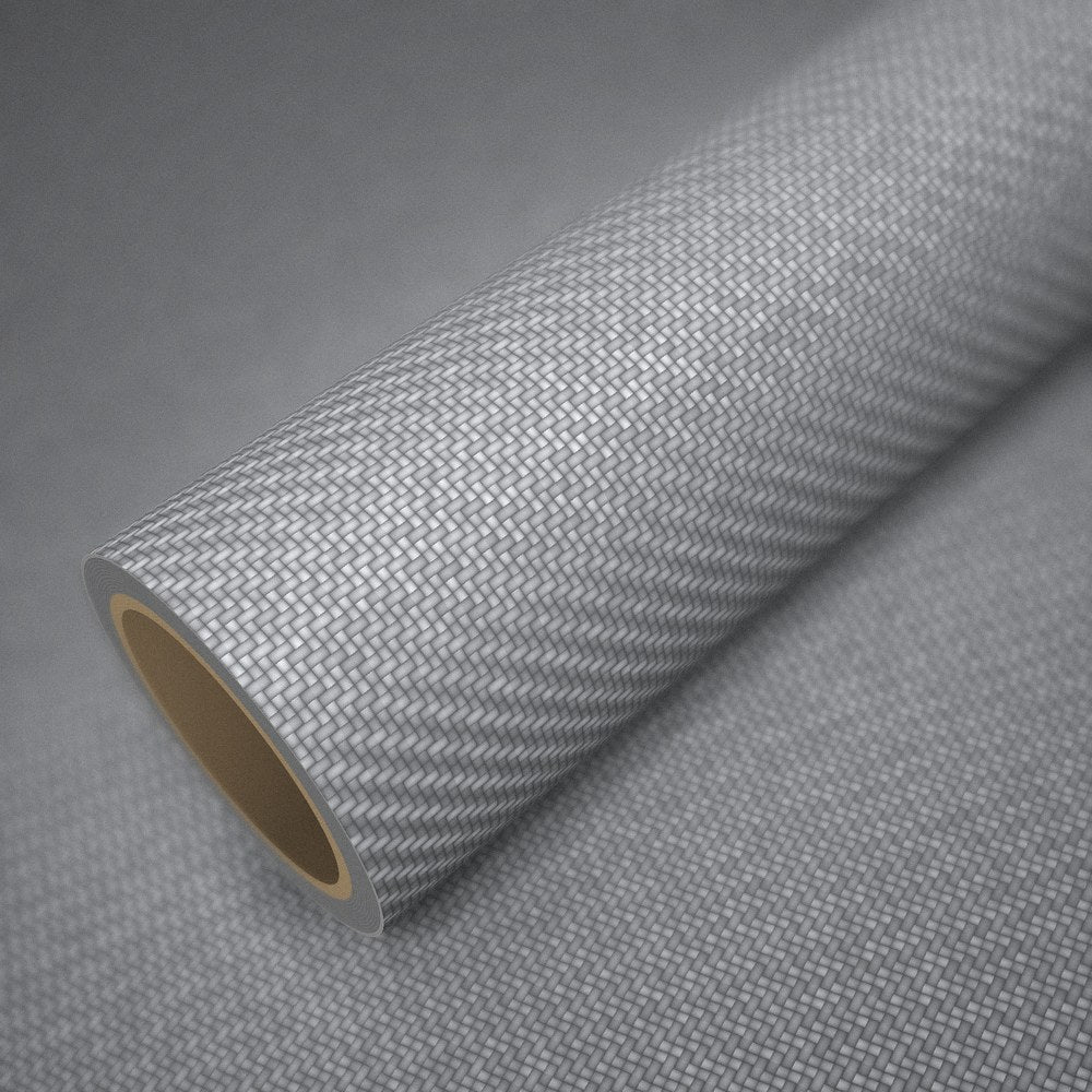 Roll of silver 3D carbon vinyl wrap on a sheet of the same vinyl