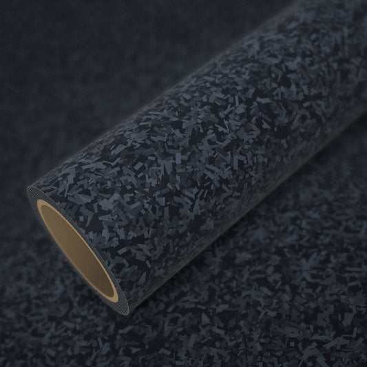 Roll of 3D forged carbon vinyl wrap on a sheet of the same vinyl