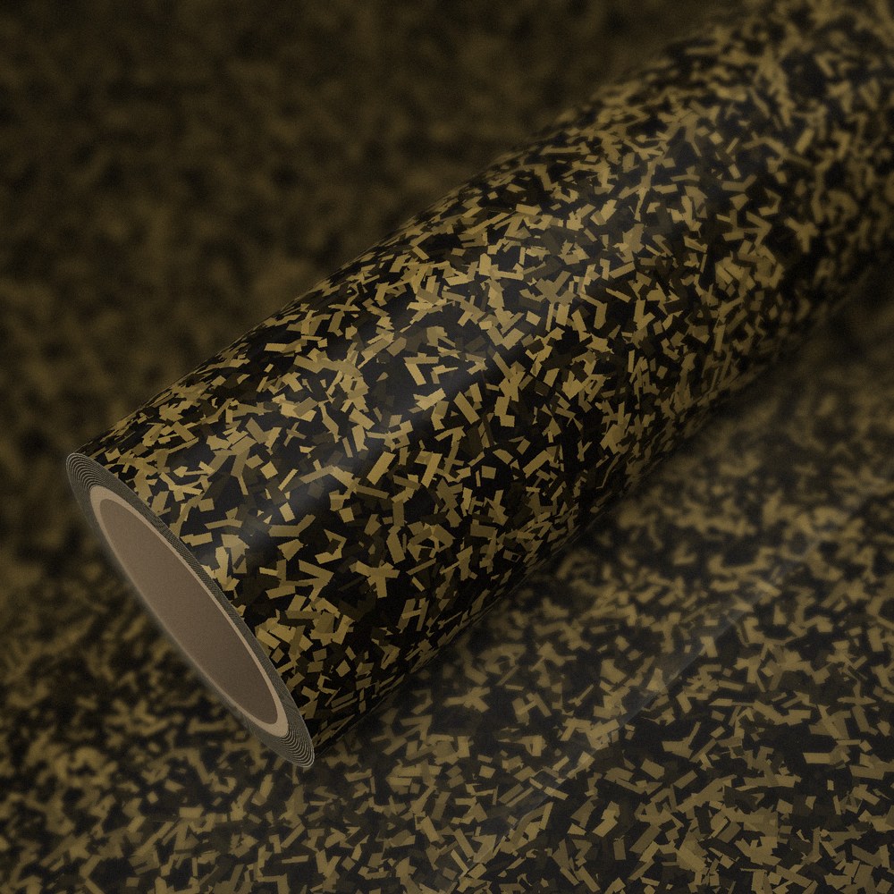 Roll of gloss gold forged carbon vinyl wrap on a sheet of the same vinyl