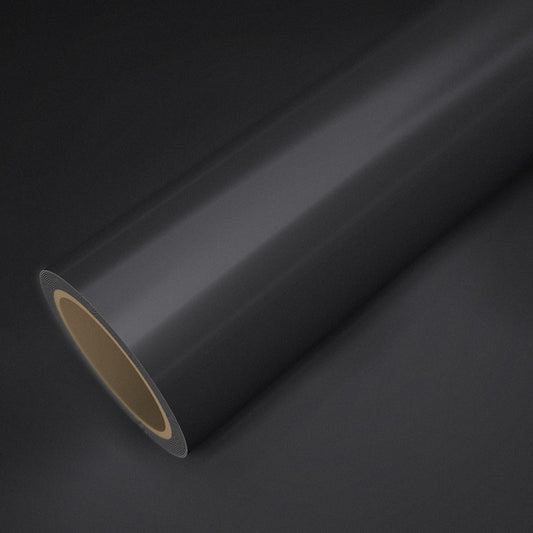 Roll of satin chrome anthracite vinyl wrap on a sheet of the same vinyl