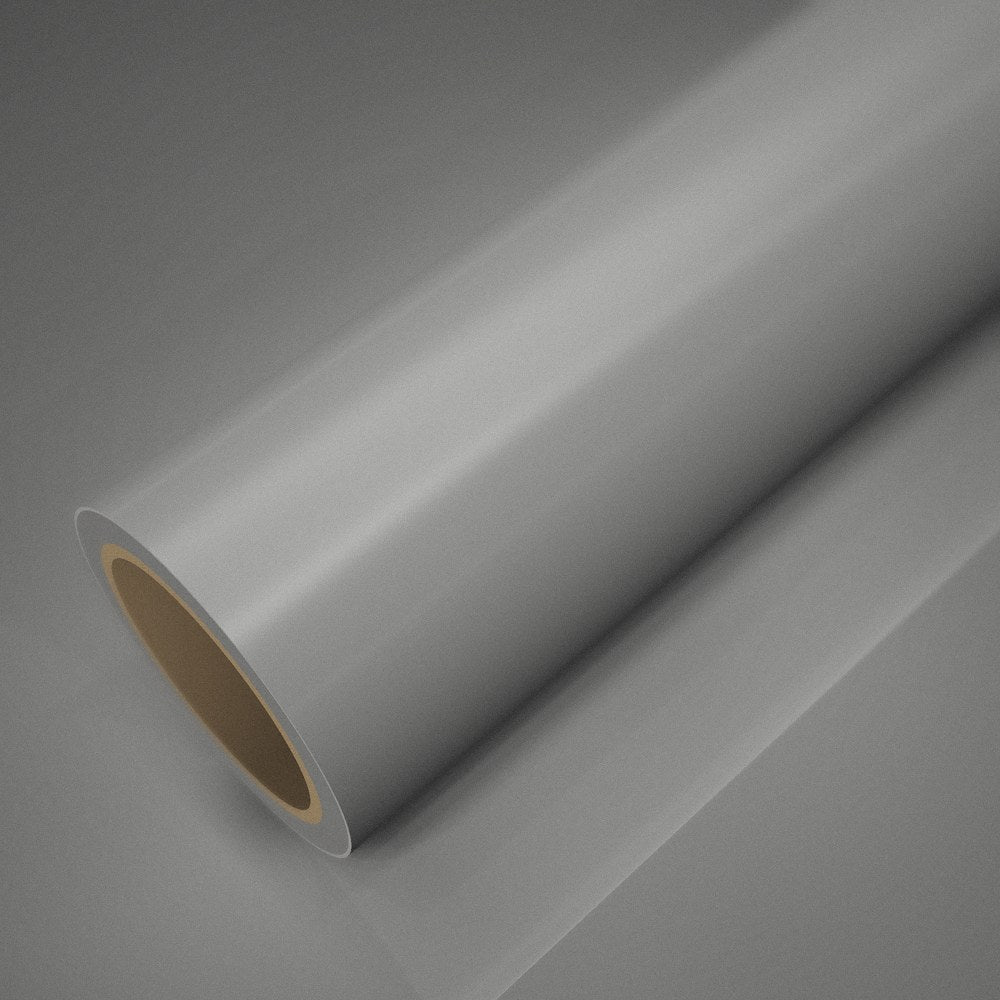 Roll of gloss white vinyl wrap on a sheet of the same vinyl