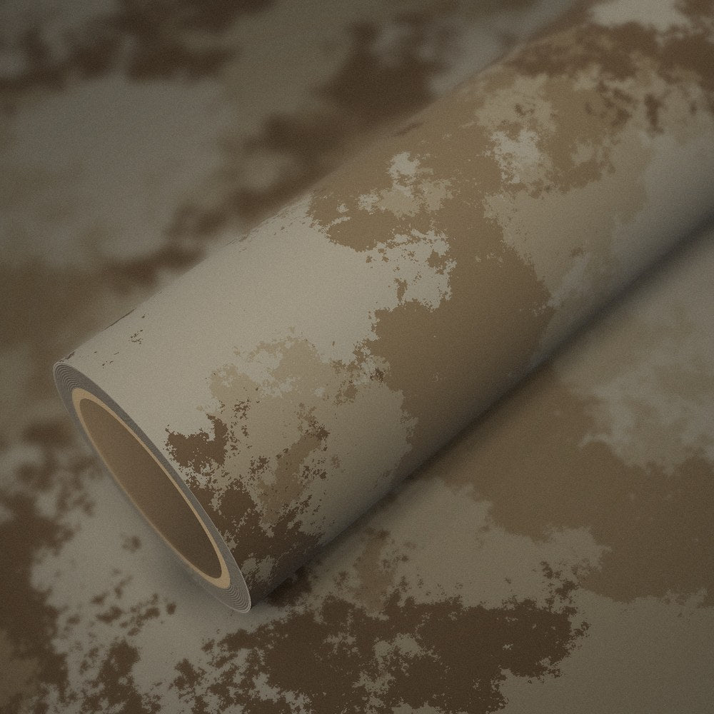 Roll of sand camo vinyl wrap on a sheet of the same vinyl