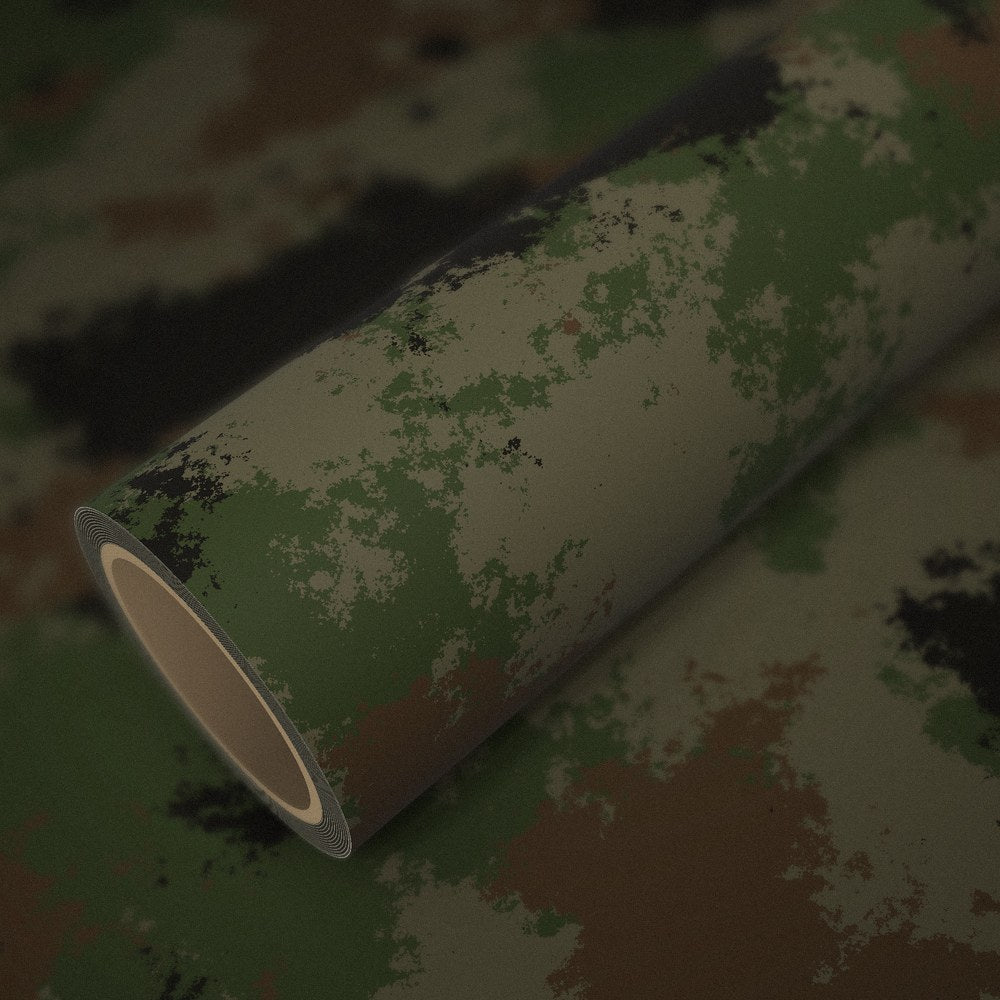 Roll of classic camo vinyl wrap on a sheet of the same vinyl